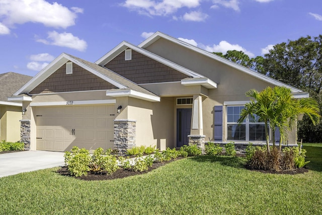 craftsman inspired home featuring a garage and a front yard