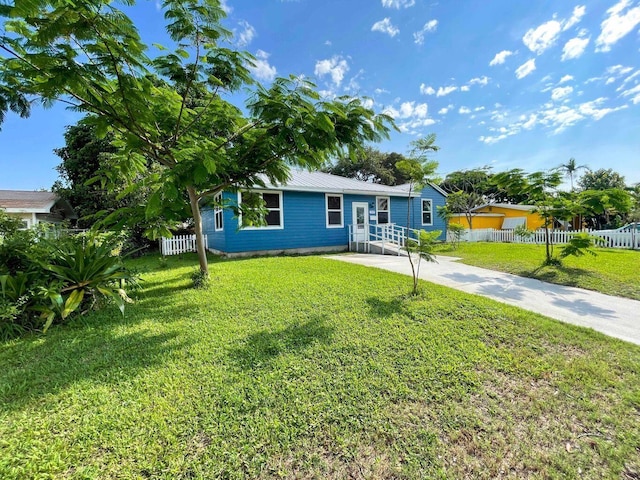 view of front of house with a front yard