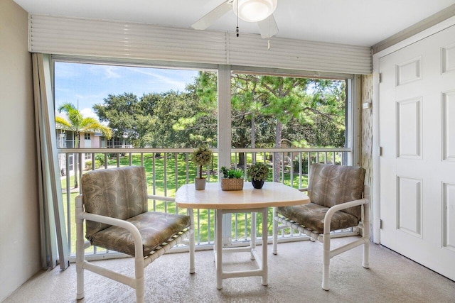 sunroom / solarium with ceiling fan