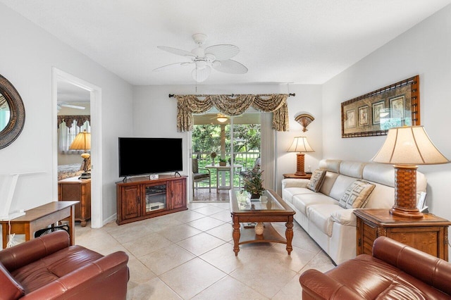 living room with light tile patterned floors and ceiling fan