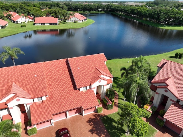 bird's eye view with a water view