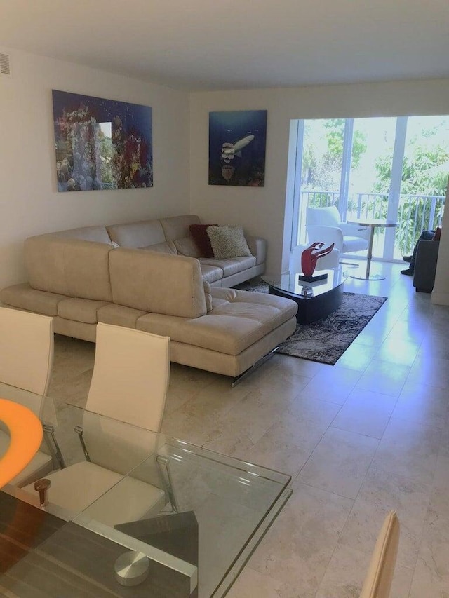 living room featuring tile patterned flooring