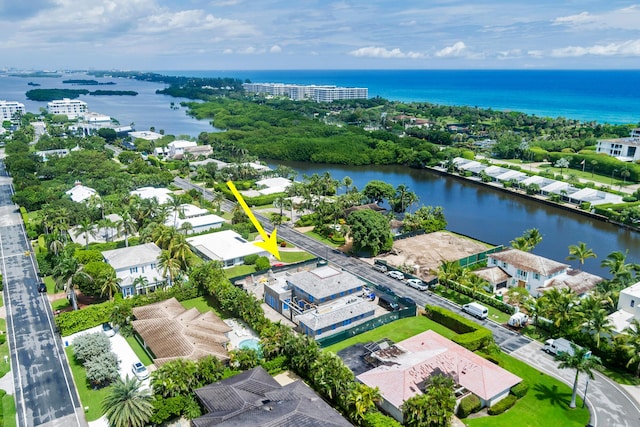 bird's eye view with a residential view and a water view