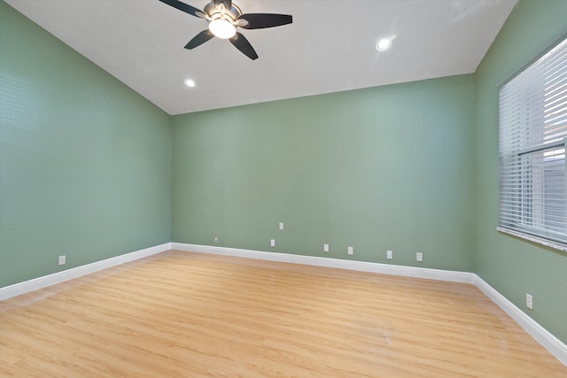 empty room with light hardwood / wood-style flooring and ceiling fan