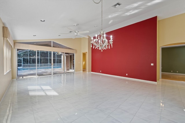 10860 Fairmont Village Dr, Lake Worth, FL 33449 - empty room with high vaulted ceiling, visible vents, ceiling fan with notable chandelier, and baseboards