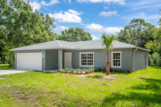 ranch-style home featuring a front yard and a garage