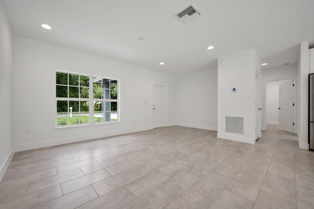 view of tiled empty room