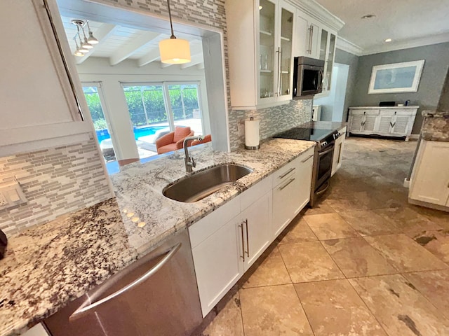 kitchen with beamed ceiling, hanging light fixtures, stainless steel appliances, sink, and white cabinetry