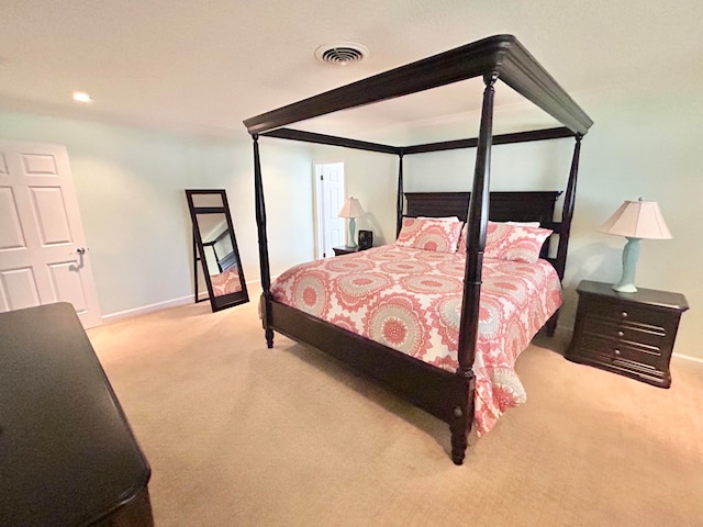 bedroom with light carpet