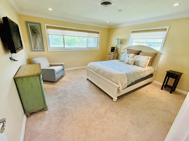 bedroom featuring crown molding, multiple windows, a textured ceiling, and light colored carpet