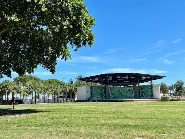 view of property's community with a yard and a gazebo