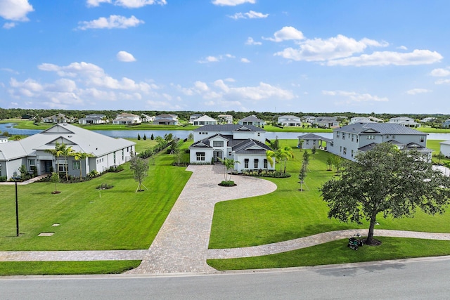 aerial view with a water view and a residential view