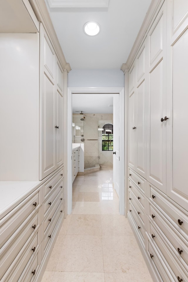 hallway with light tile patterned floors