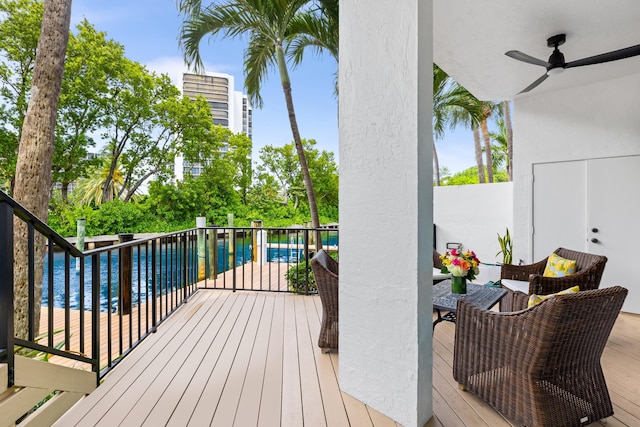 wooden deck with ceiling fan