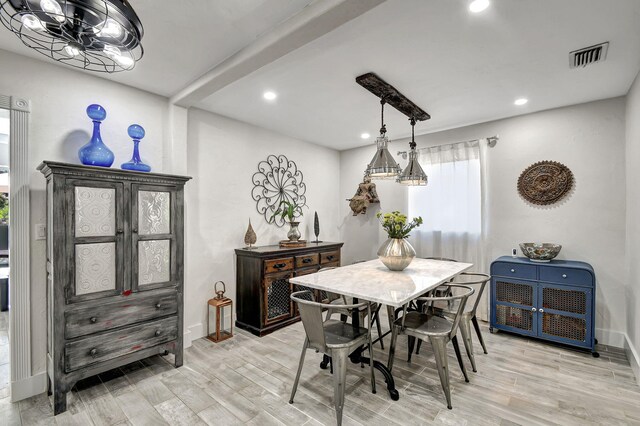 dining space with visible vents, baseboards, light wood-style flooring, and recessed lighting