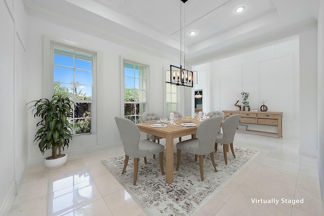 dining area featuring light tile patterned floors, baseboards, recessed lighting, a raised ceiling, and a chandelier