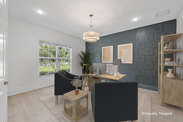 home office with recessed lighting, baseboards, and light wood-type flooring