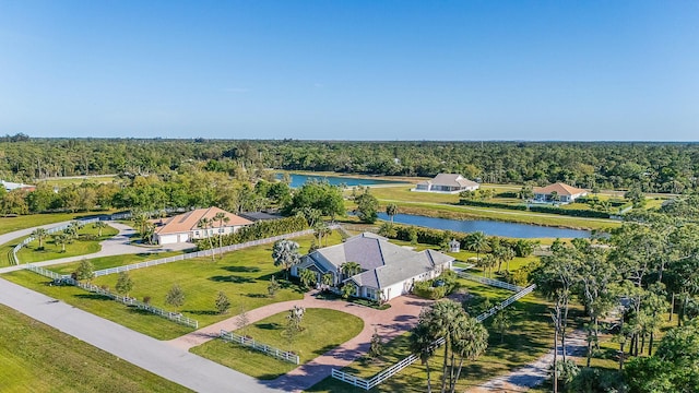 aerial view with a view of trees and a water view