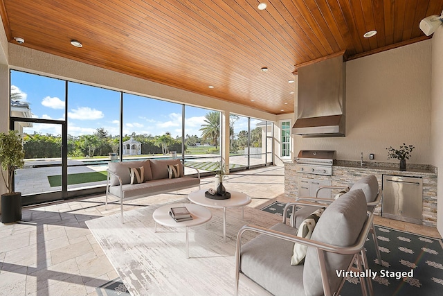 sunroom / solarium with wood ceiling