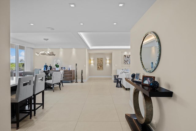 interior space featuring light tile patterned floors and a notable chandelier