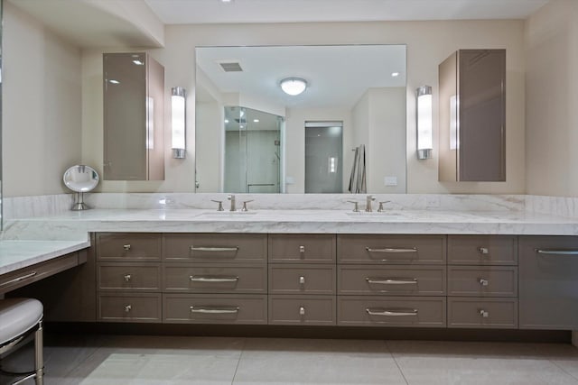 full bath with double vanity, tile patterned flooring, a sink, and visible vents