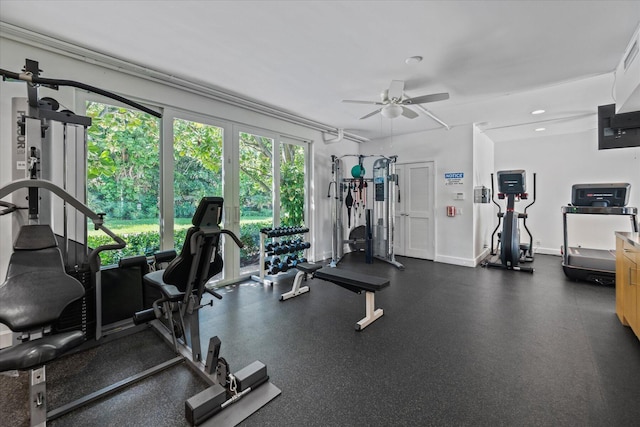 exercise room featuring recessed lighting, ceiling fan, and baseboards