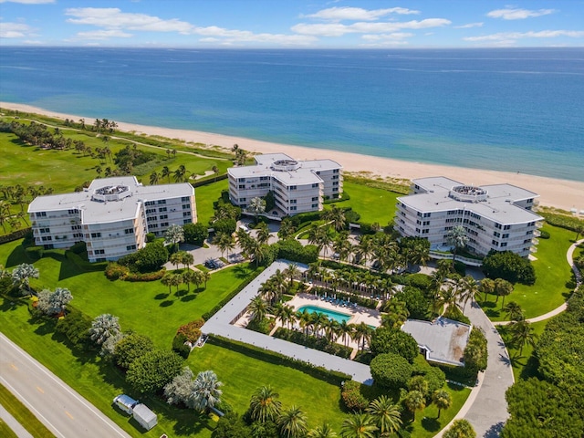 aerial view featuring a water view and a view of the beach