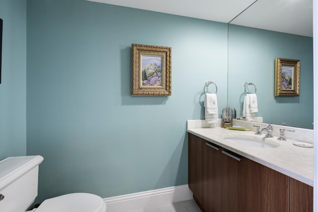 bathroom with vanity and a relaxing tiled tub