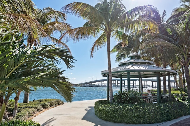 view of community with a gazebo and a water view