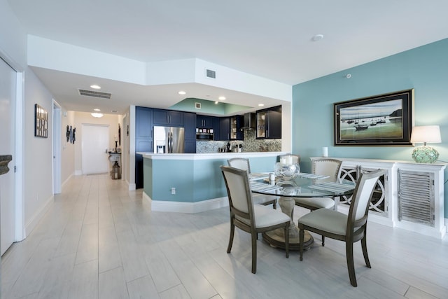 dining area featuring light hardwood / wood-style flooring