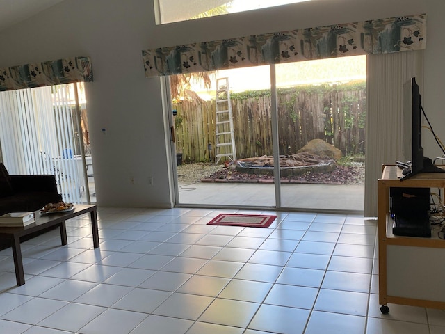 doorway featuring light tile patterned flooring