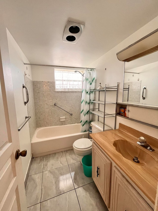 full bathroom with tile patterned flooring, vanity, toilet, and shower / bath combo