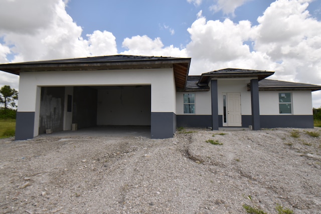 view of front of home with a garage