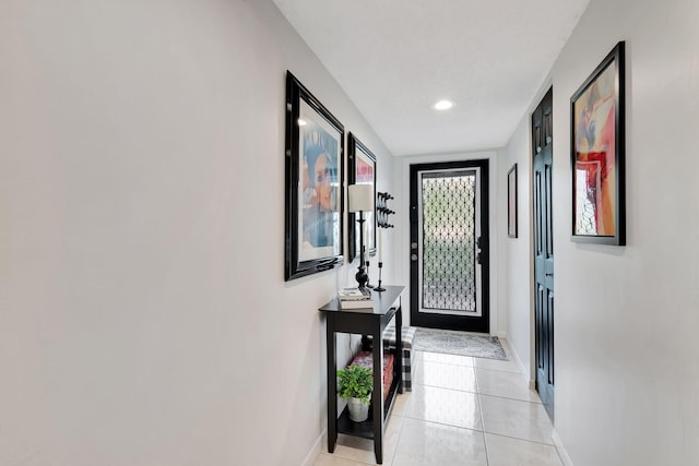 entryway featuring light tile patterned flooring