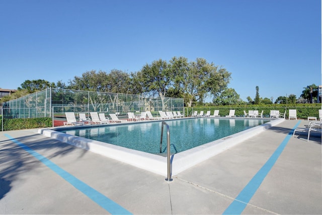 view of swimming pool featuring a patio area