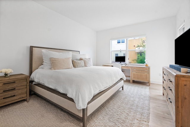 bedroom with light wood-type flooring