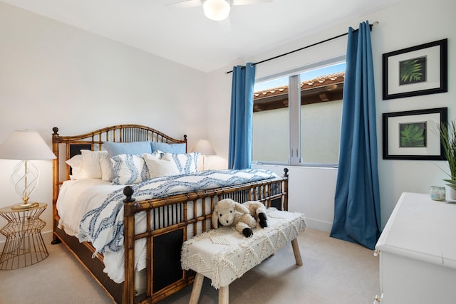 bedroom featuring carpet flooring, multiple windows, and ceiling fan