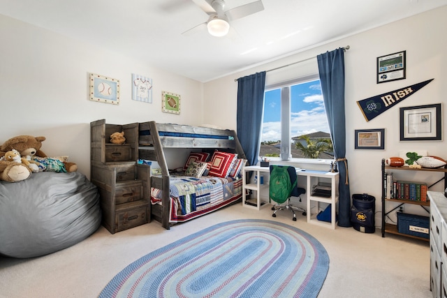 bedroom featuring ceiling fan and light colored carpet