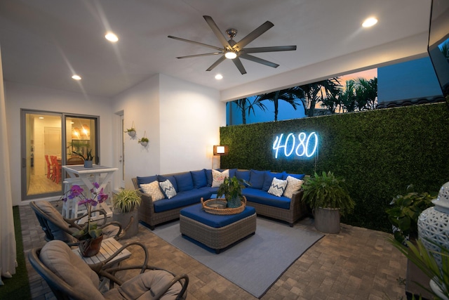 living room featuring ceiling fan