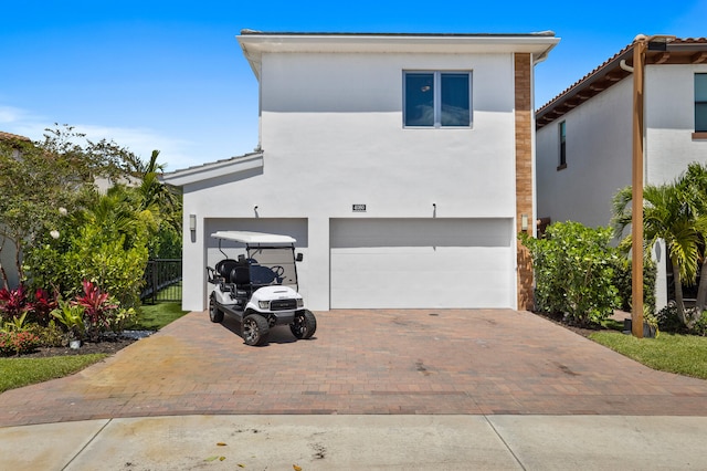 view of front of home with a garage