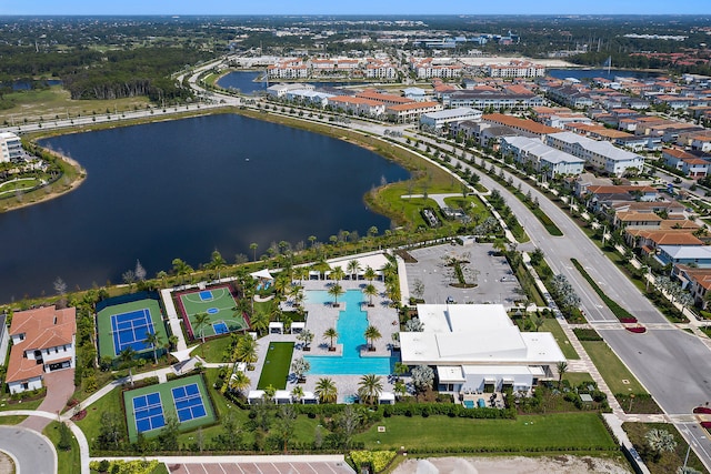 birds eye view of property featuring a water view