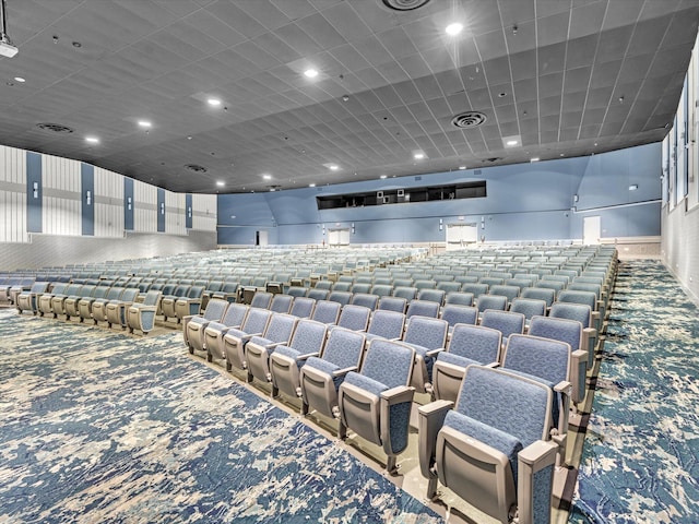 cinema featuring carpet floors