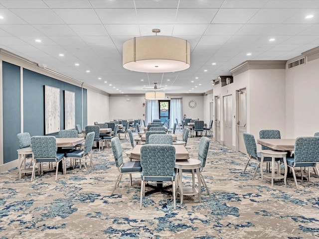 dining area featuring carpet flooring