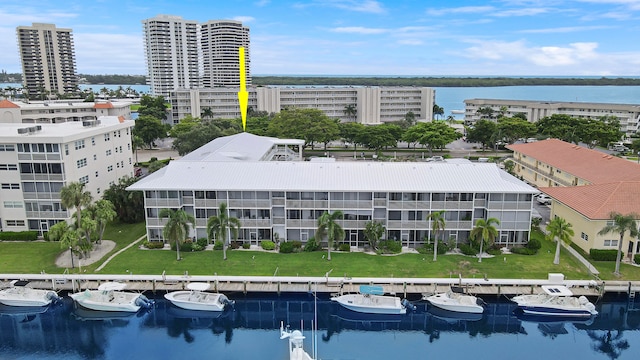 drone / aerial view featuring a water view