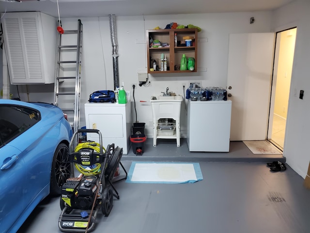 clothes washing area featuring independent washer and dryer