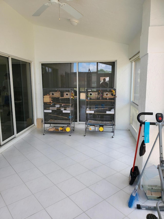 view of patio featuring ceiling fan