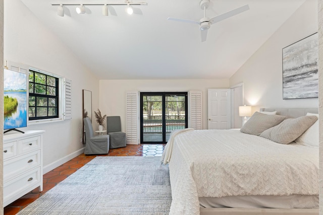 tiled bedroom with high vaulted ceiling, ceiling fan, and access to exterior