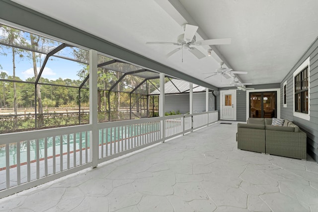 view of patio / terrace with a lanai and ceiling fan