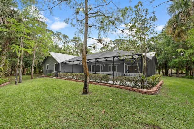 view of yard featuring a lanai