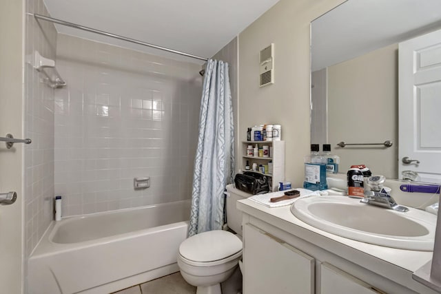 full bathroom featuring tile patterned flooring, vanity, toilet, and shower / tub combo with curtain